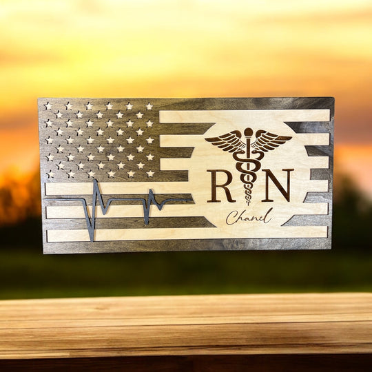 Custom flag sign made for a nurse: caduceus emblem, raised heartbeat line and an RN script name