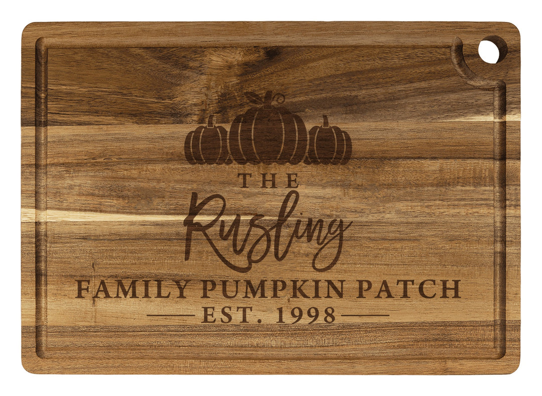 Personalized cutting board engraved with The Family Pumpkin Patch, your name and year