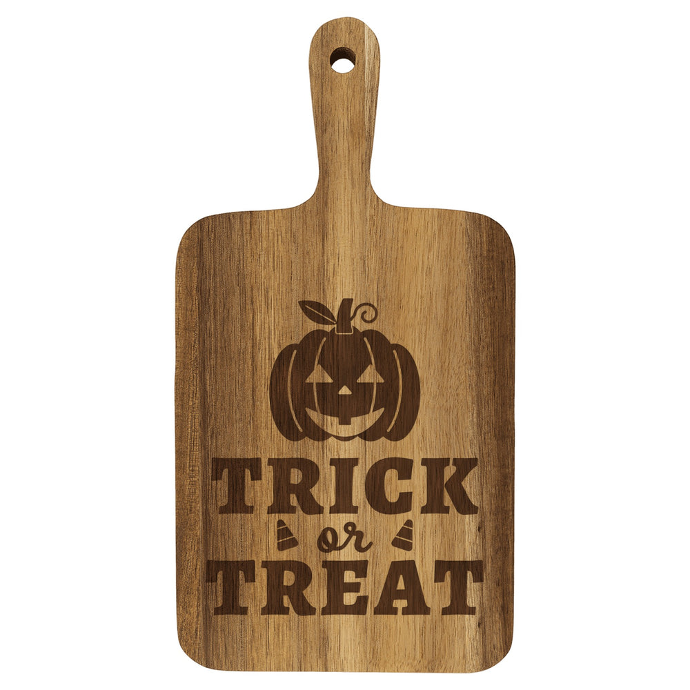 Personalized paddle cutting board engraved with Trick or Treat